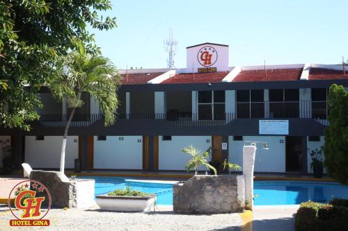 Gina, Tecomán